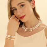 Load image into Gallery viewer, AAA+ Quality Triple Strand Freshwater Pearl Necklace Bracelet and Stud Earrings
