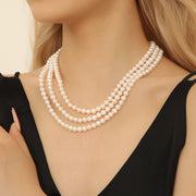 triple strand pearl necklace
