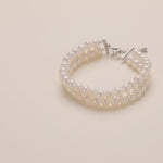 Load and play video in Gallery viewer, AAA+ Quality Double Strand Freshwater Pearl Bracelet for Women

