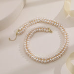 Load and play video in Gallery viewer, AAA+ Quality Double Strand Golden Freshwater Pearl Necklace
